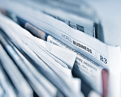 Photo of newspapers.