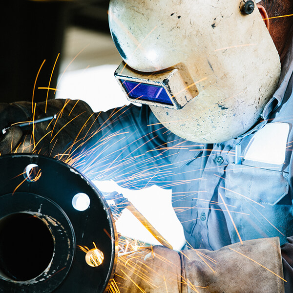 Photo of a welder working.